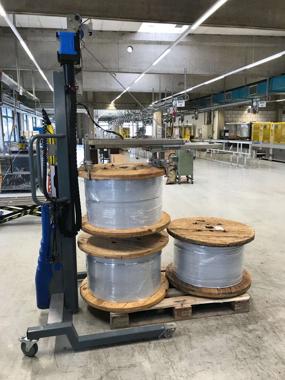 Pick up rolls, coils and cable drums safely